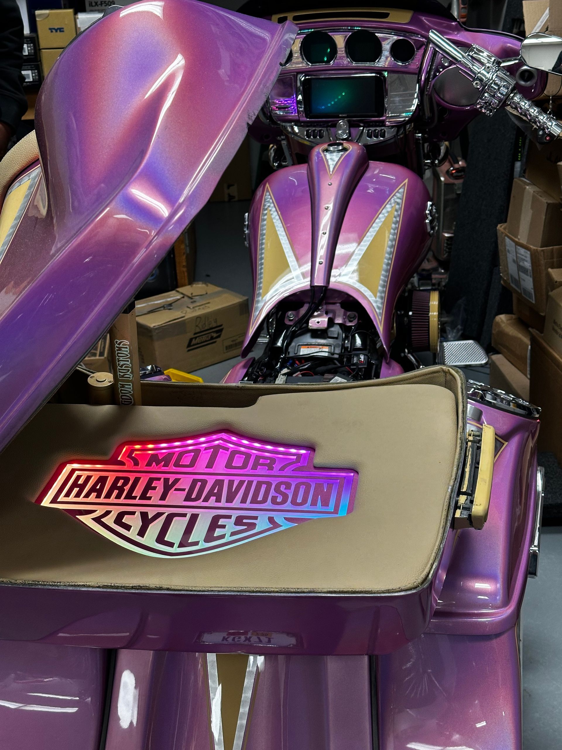 A car dashboard with a screen that says track 4 on it