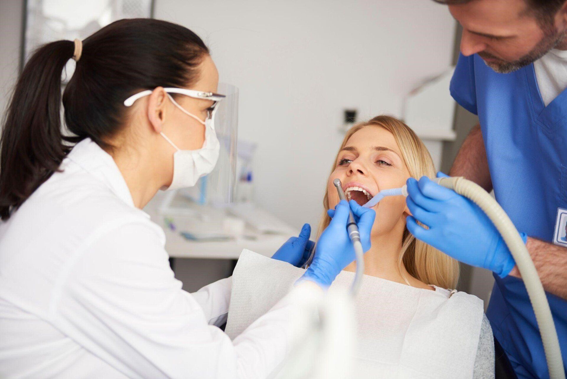 a woman getting a root canal treatment