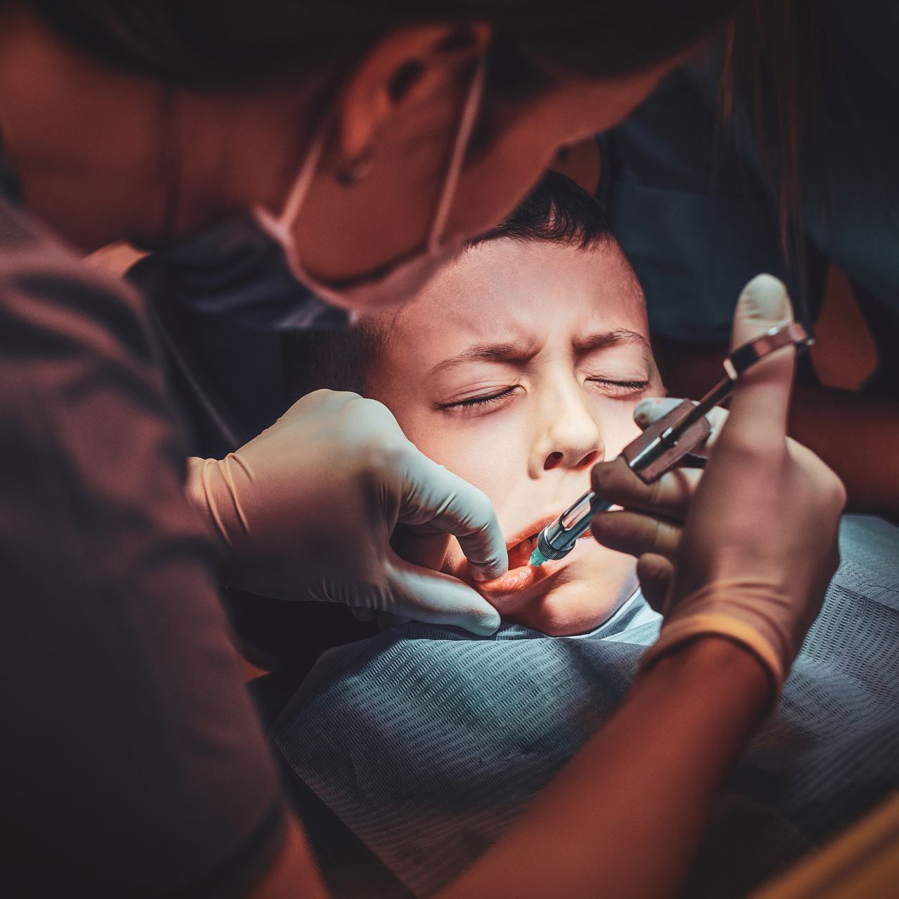 child undergoing a dental procedure