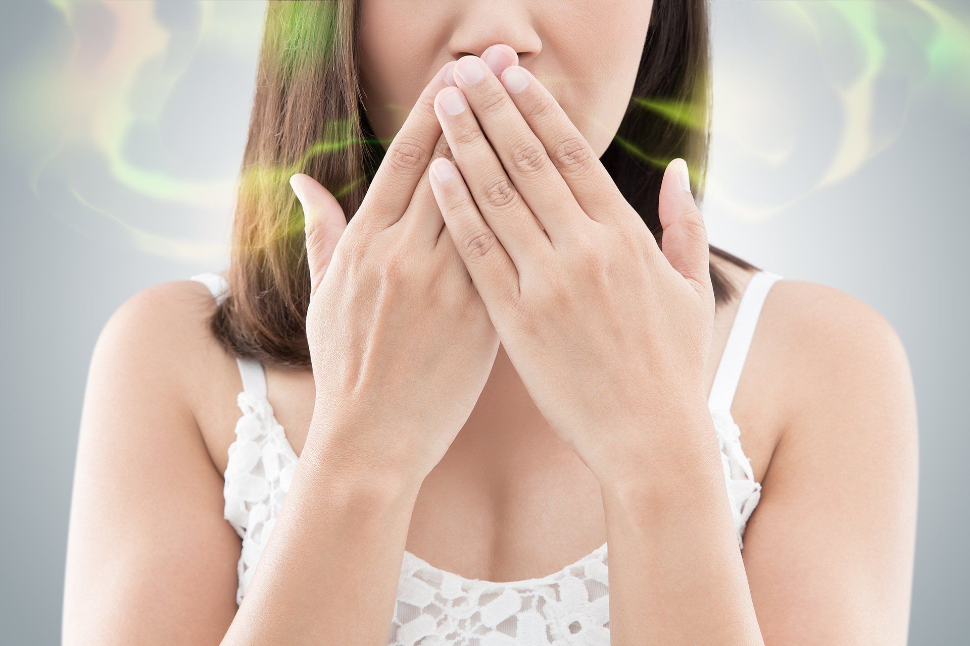 a woman suffering from bad breath