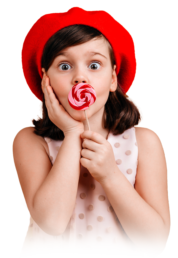 a little child holding a lollipop