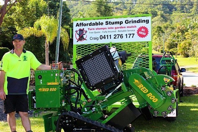 Man With Stump Grinder - Gold Coast, QLD - Affordable Stump Grinding