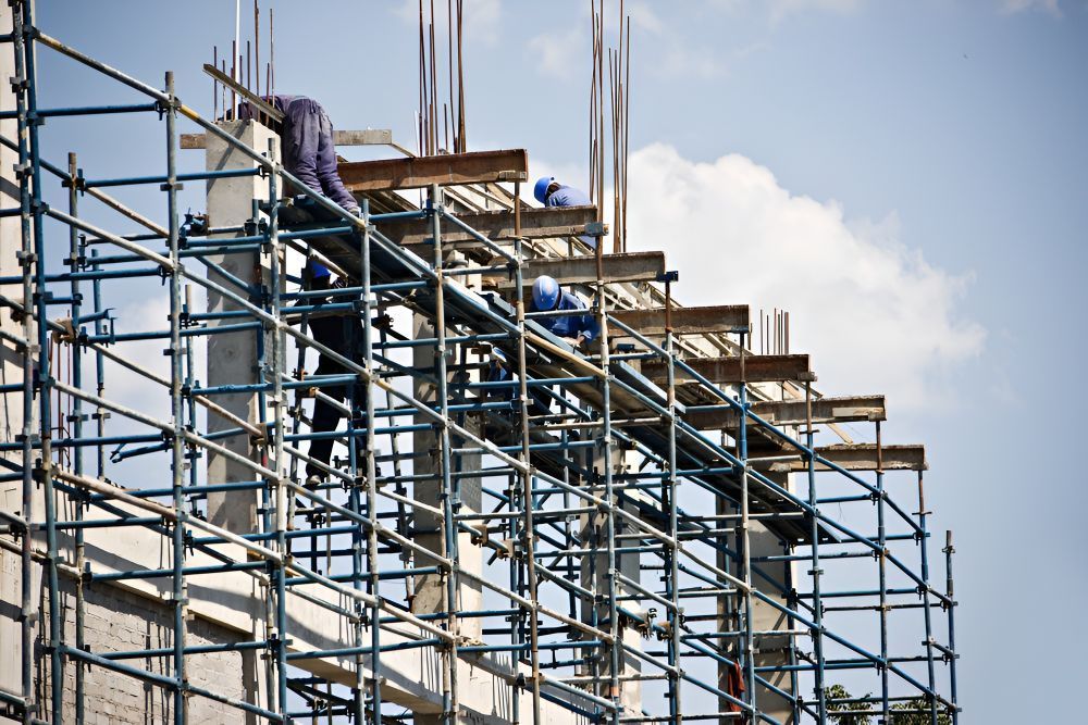 Construction Workers on Scaffolding — Lennox Head Scaffolding in Lismore, NSW