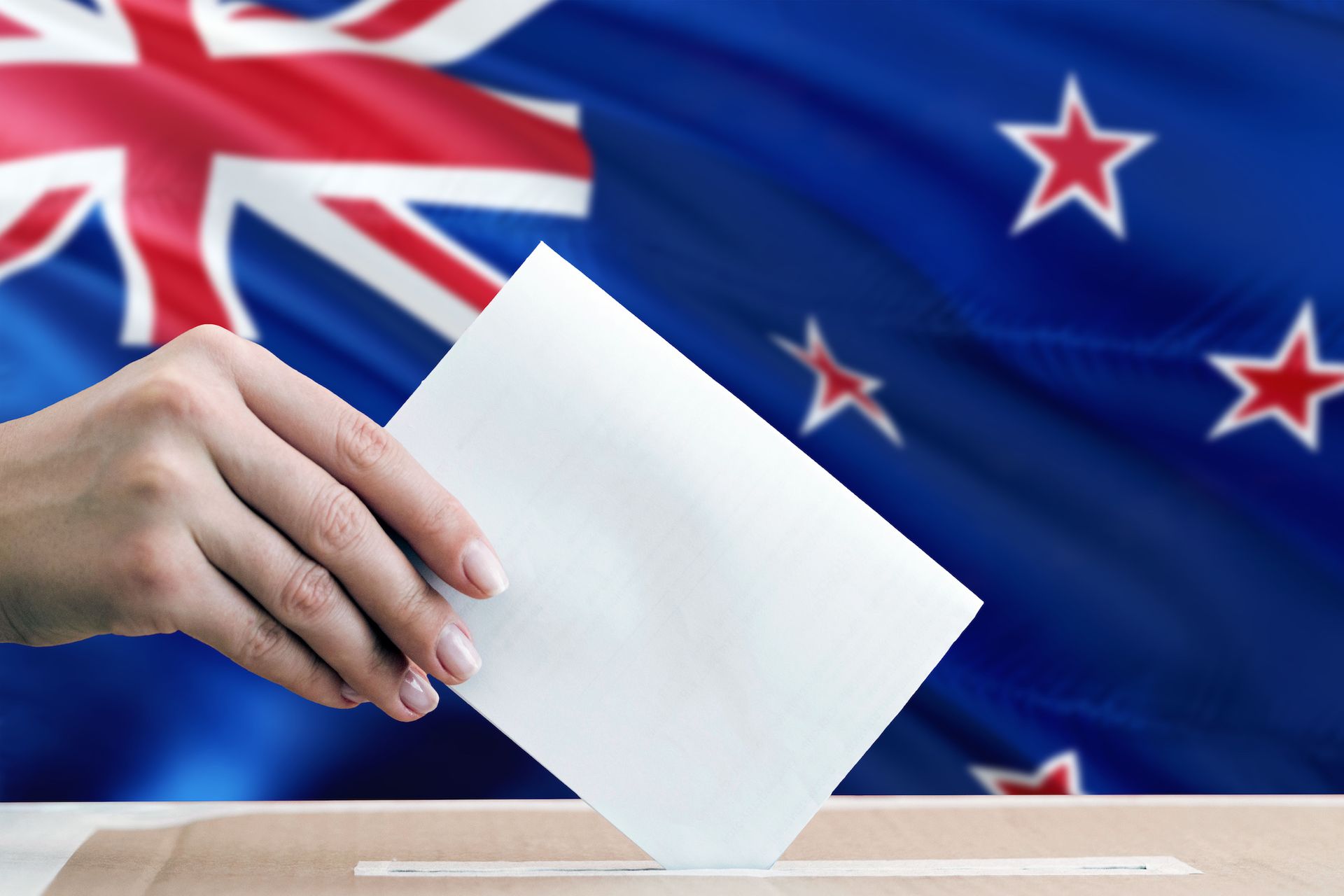 DormFIN Insurance Broker vote 
A ballot into a ballot box a new zealand flag