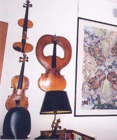 Instruments Hanging up, Cello Rentals in Ardmore, PA
