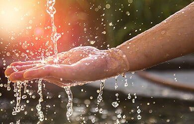 Hands with Water Splash — Clean Water in Glasgow, VA