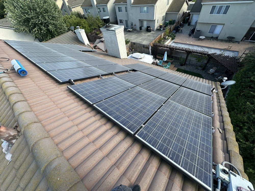 A roof with a lot of solar panels on it