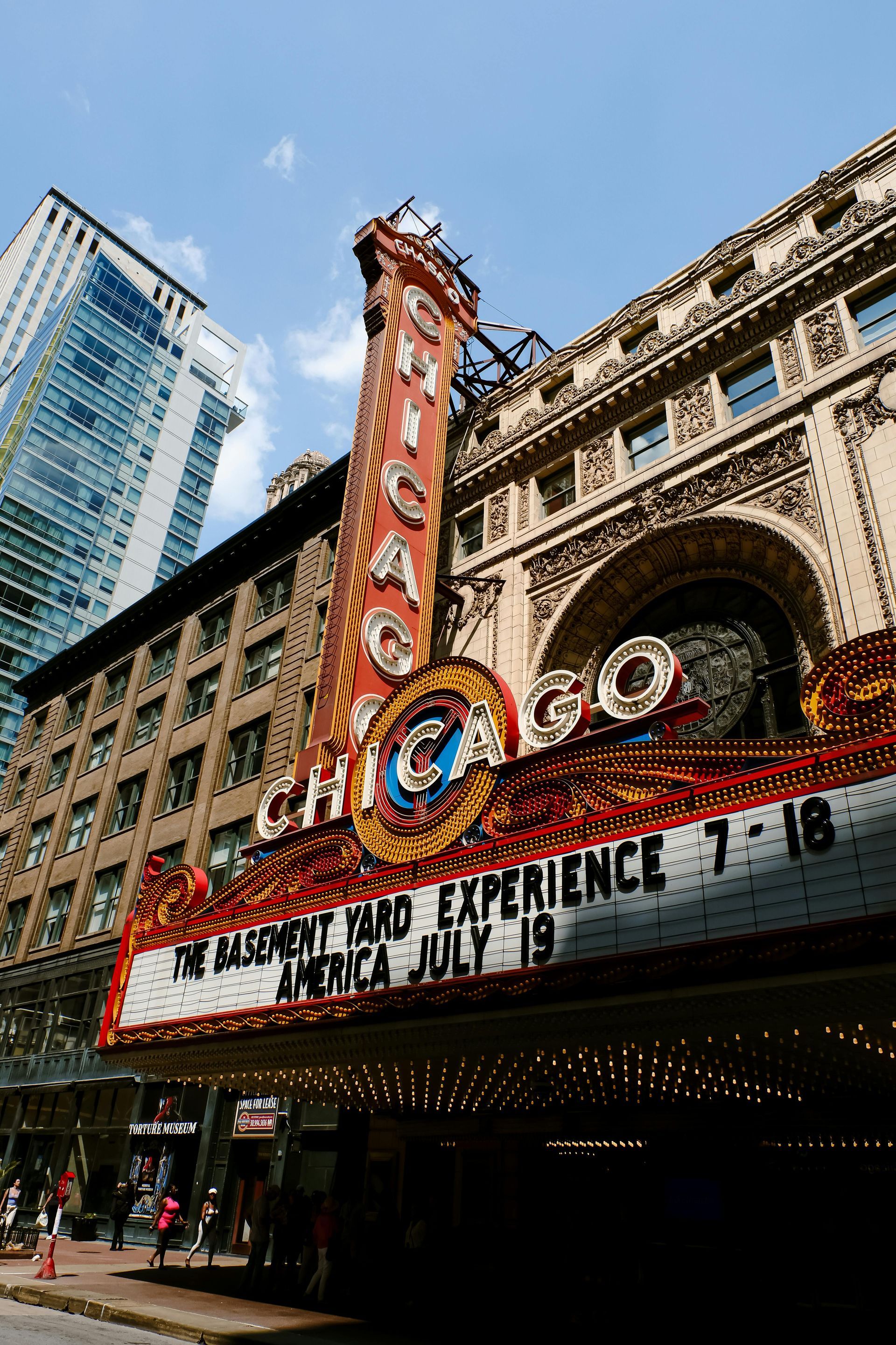 Chicago Theatre marquee with bright lights, displaying
