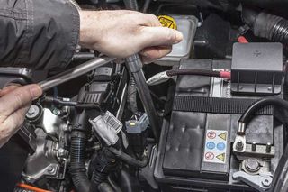 Man Putting Battery in the Car — Car Battery Replacement in South Lismore, NSW