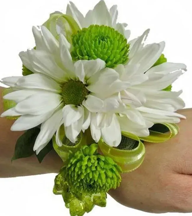 A Person is Wearing a Wristband With White and Green Flowers — Flower Hunt in Robina, QLD