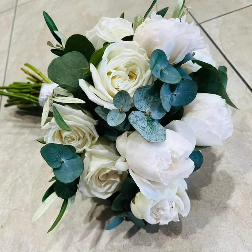 A Bouquet of White Flowers With Green Leaves — Flower Hunt in Robina, QLD