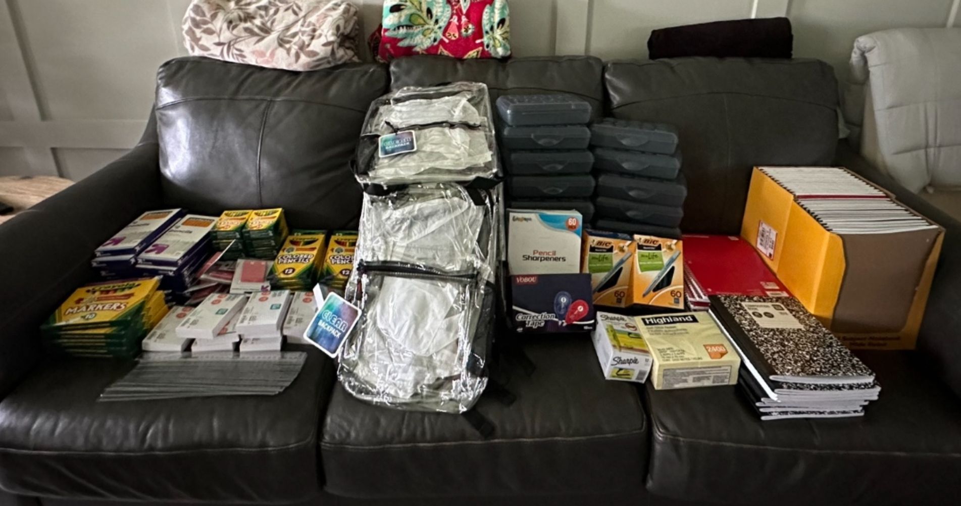 A couch with school supplies