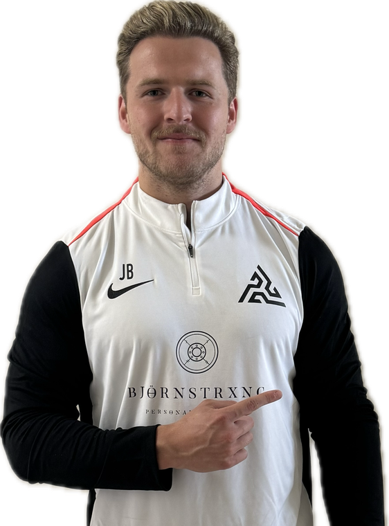 Man in white and black athletic shirt pointing right, smiling. 