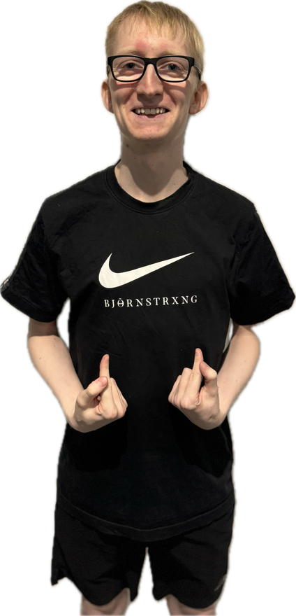 Man with glasses and a black Nike shirt gives thumbs up.