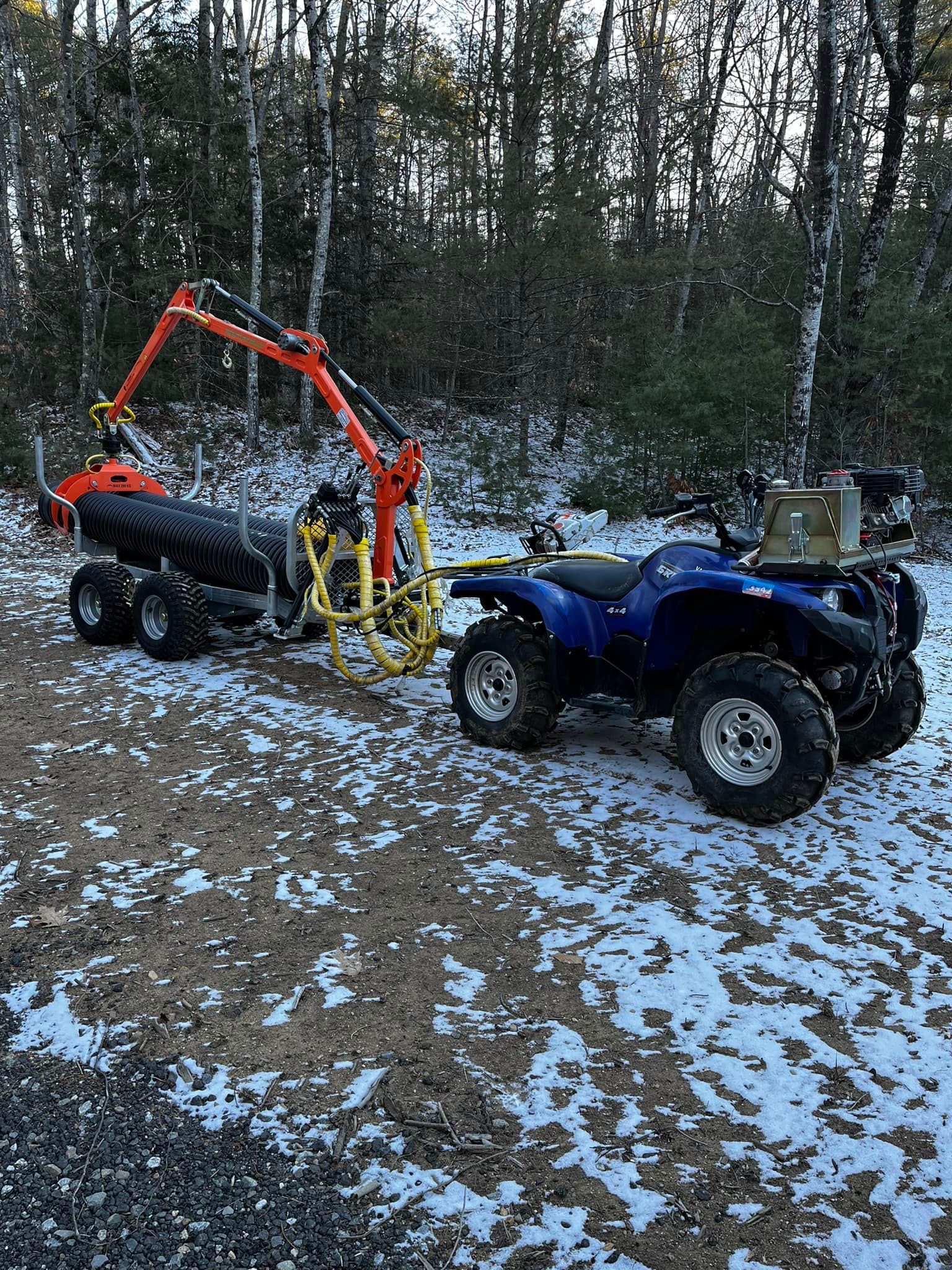 A man is working on a kitchen in a house under construction