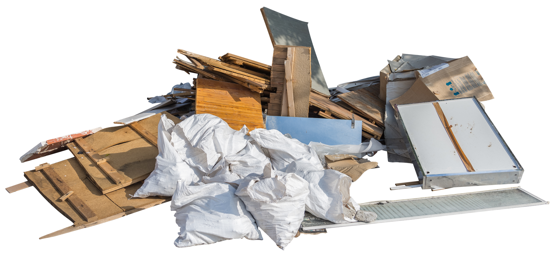 Pile of construction debris including wood, metal, and bags of material.