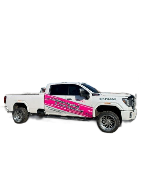 White truck with pink and gray business branding, large wheels.