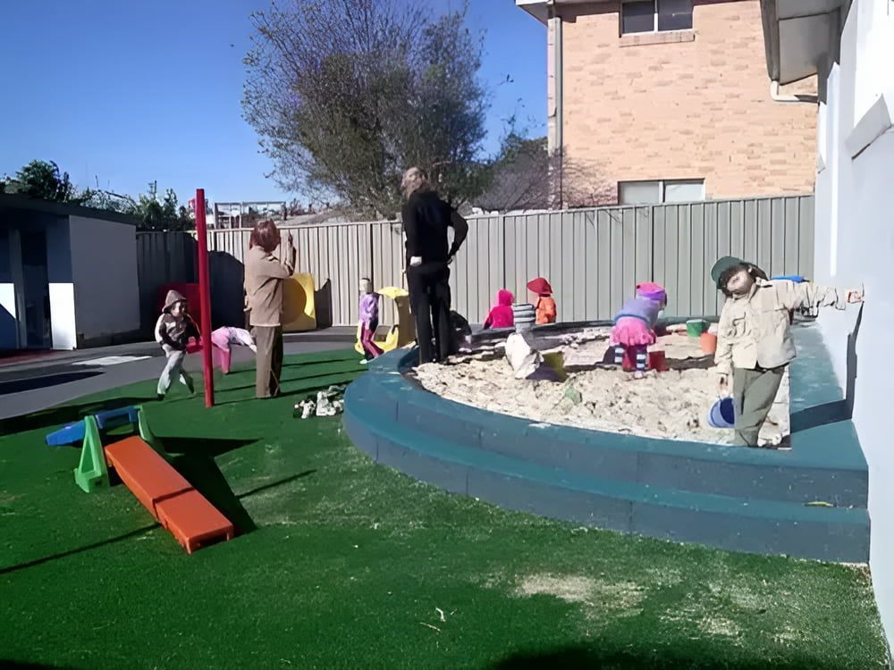 A Group of Children Are Playing in a Sandbox — Mt Ousley Pre School in Fairy Meadow, NSW