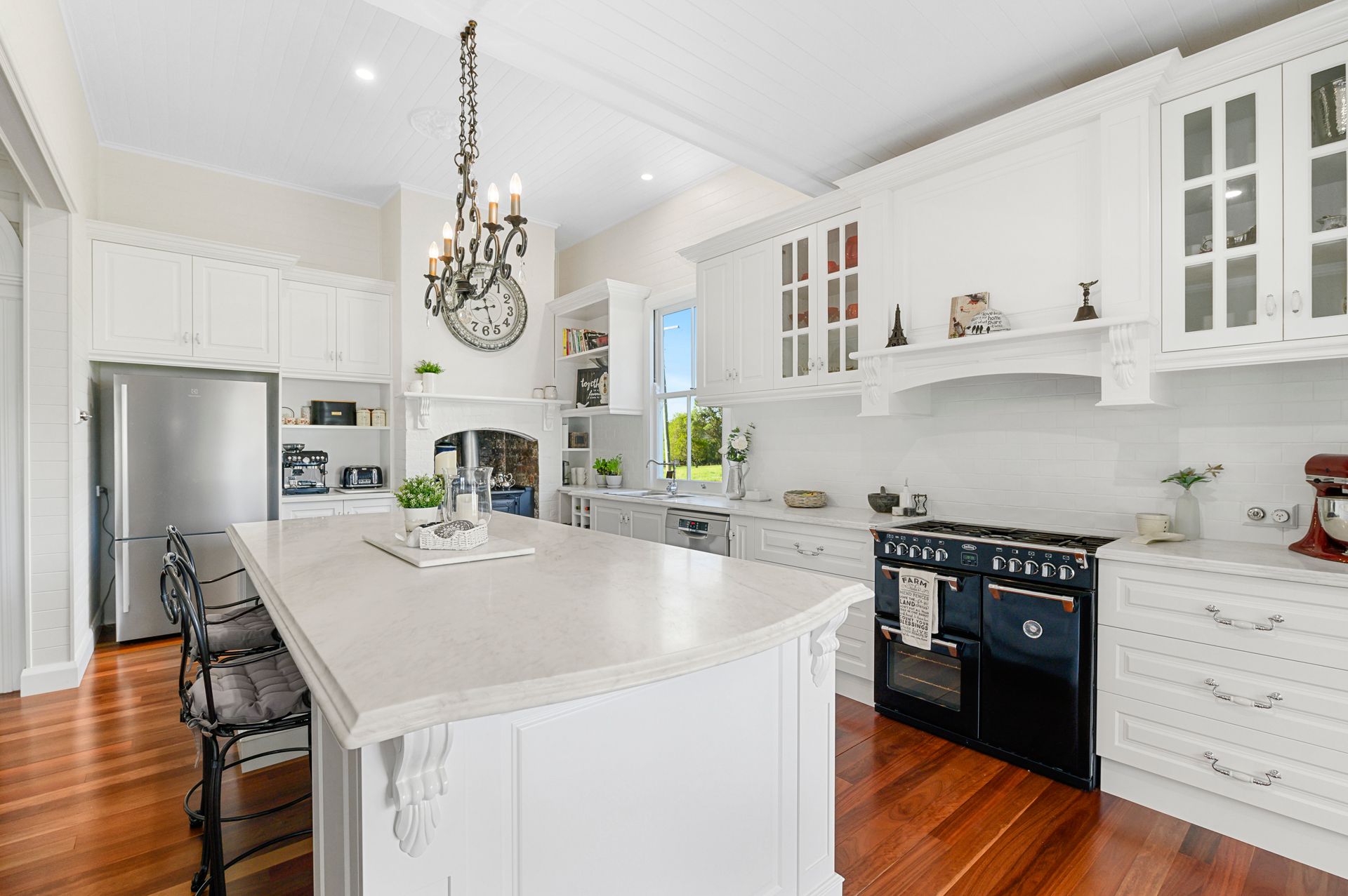 Bright Kitchen With White Cupboards and Natural Wood Counters — Plumbe Joinery in Coffs Harbour, NSW