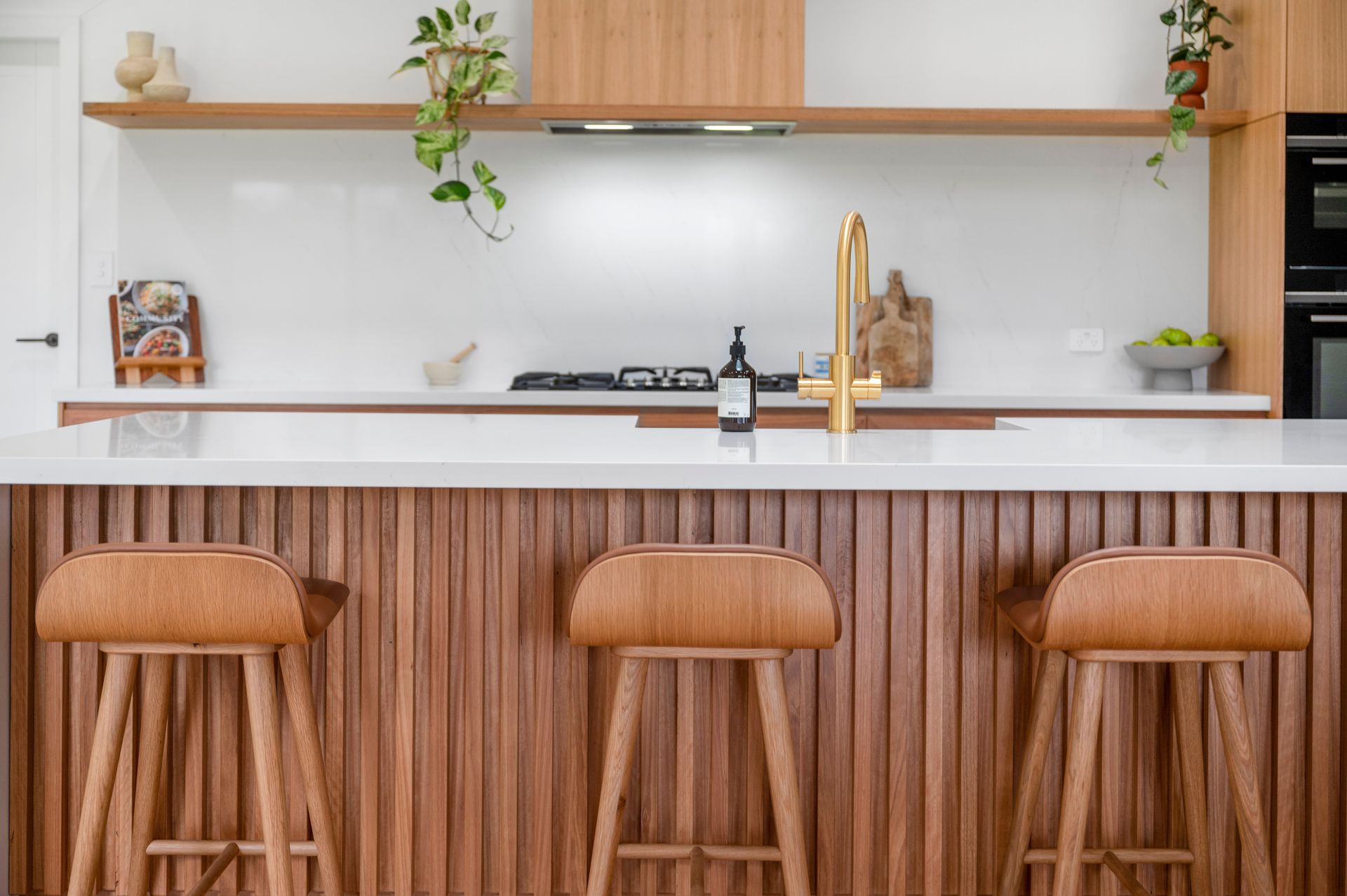 There Are Three Wooden Stools in the Kitchen — Plumbe Joinery in Coffs Harbour, NSW