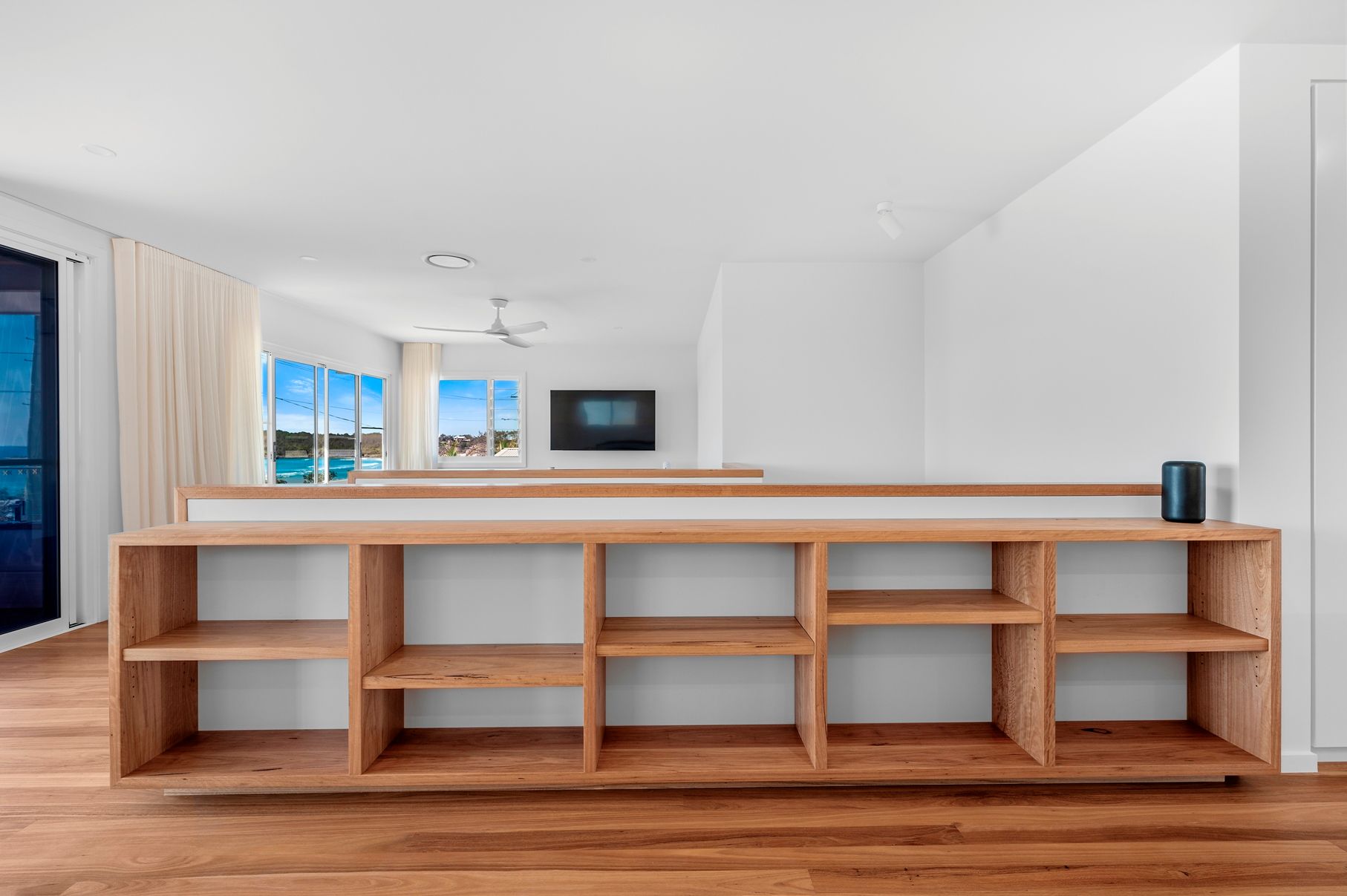 There is a Wooden Shelf in the Middle of the Room — Plumbe Joinery in Coffs Harbour, NSW