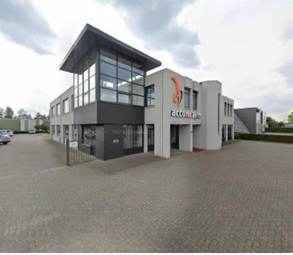 Een moderngebouw waar Perfect body & Mind in Veldhoven is gevestigd.