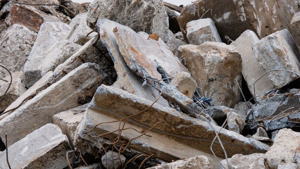 Pile of broken concrete blocks and debris.