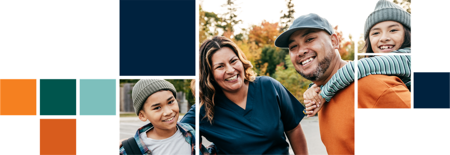 A family is posing for a picture together in a park.