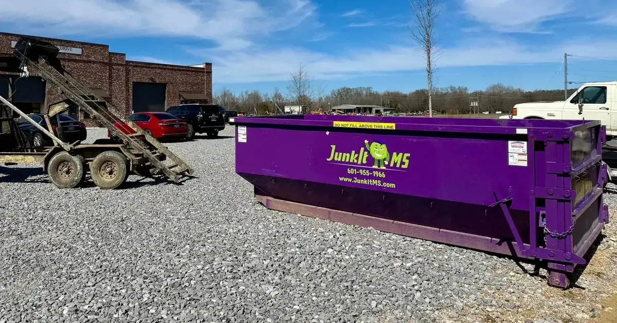 Junk-It MS purple dumpster rental in Jackson, MS