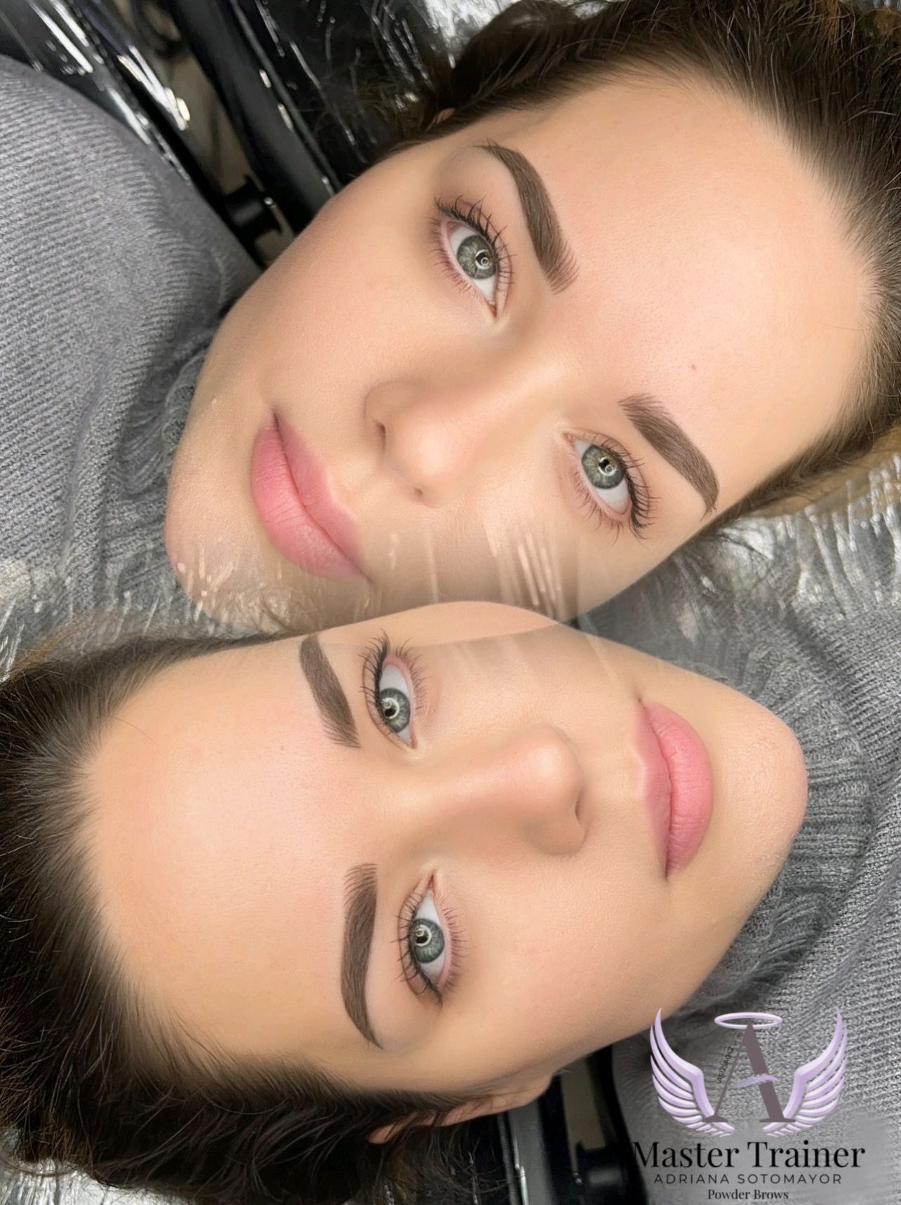 Two women with symmetrical eyebrow tattoos; light skin, gray sweaters, blue eyes.