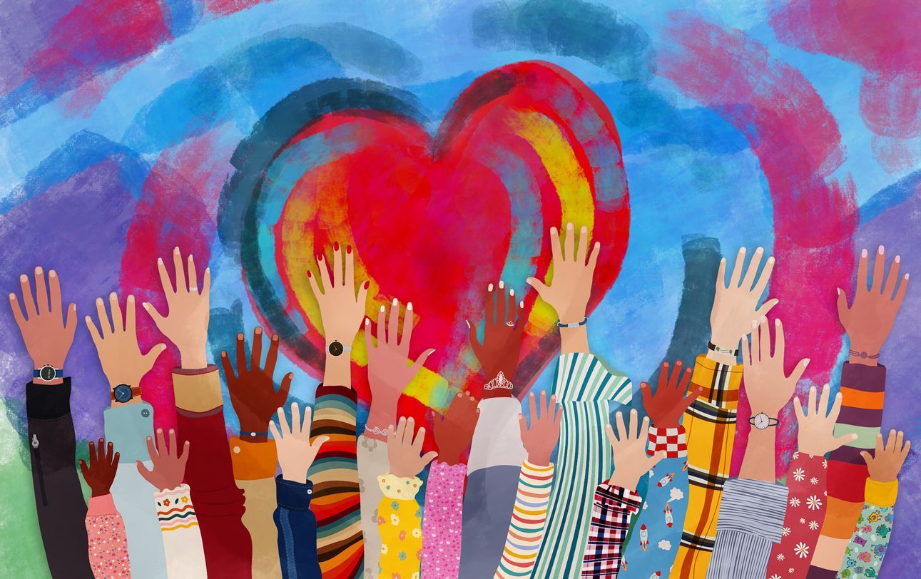 A diverse group of hands raised in front of a painted heart.