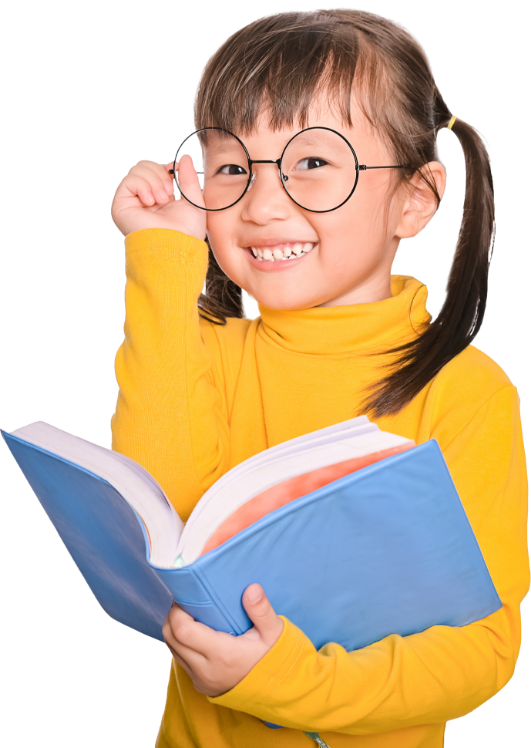 a little girl wearing glasses is reading a book