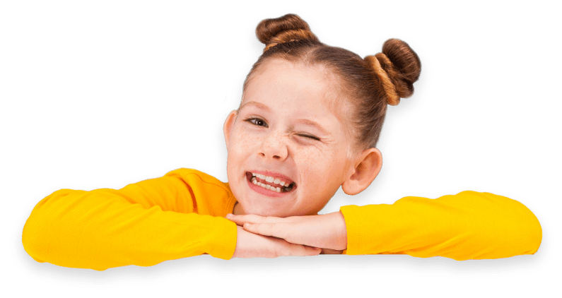a little girl in a yellow sweater is making a funny face .