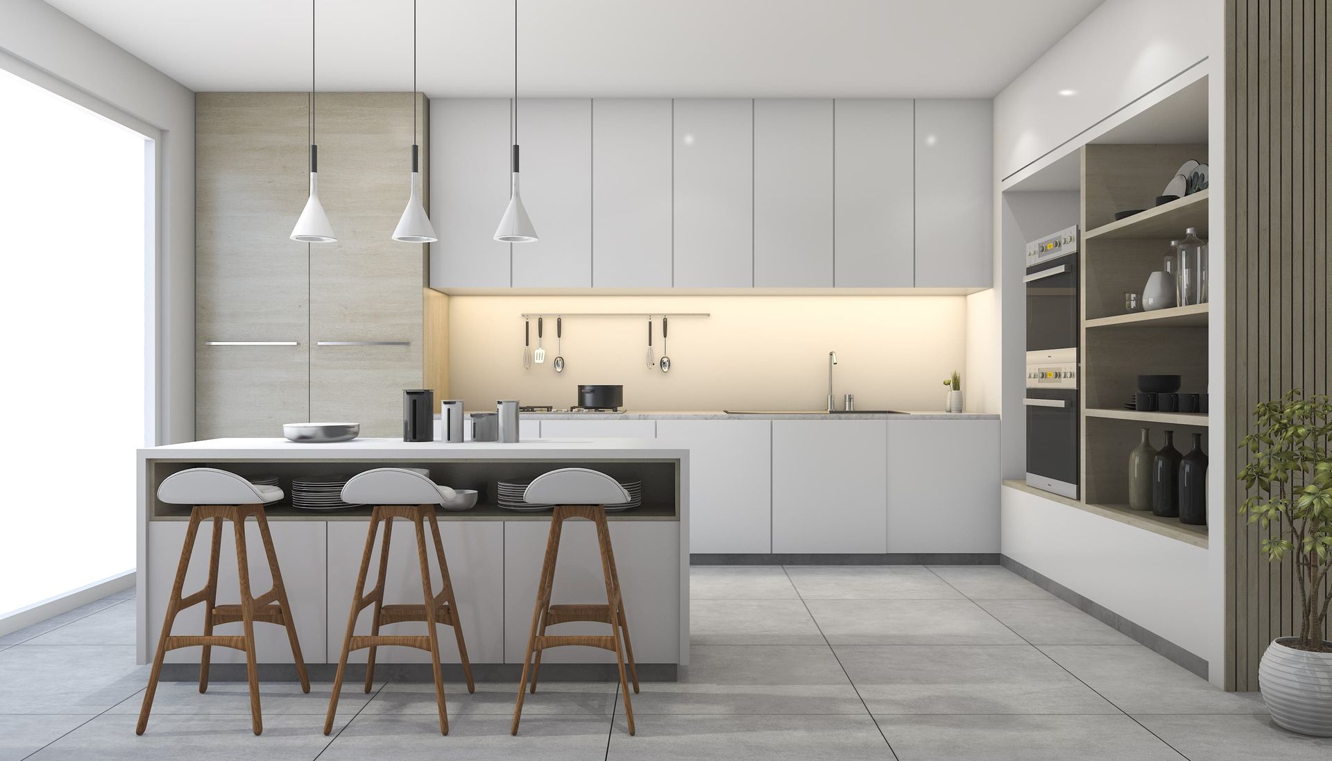 A modern kitchen with white cabinets and wooden stools.