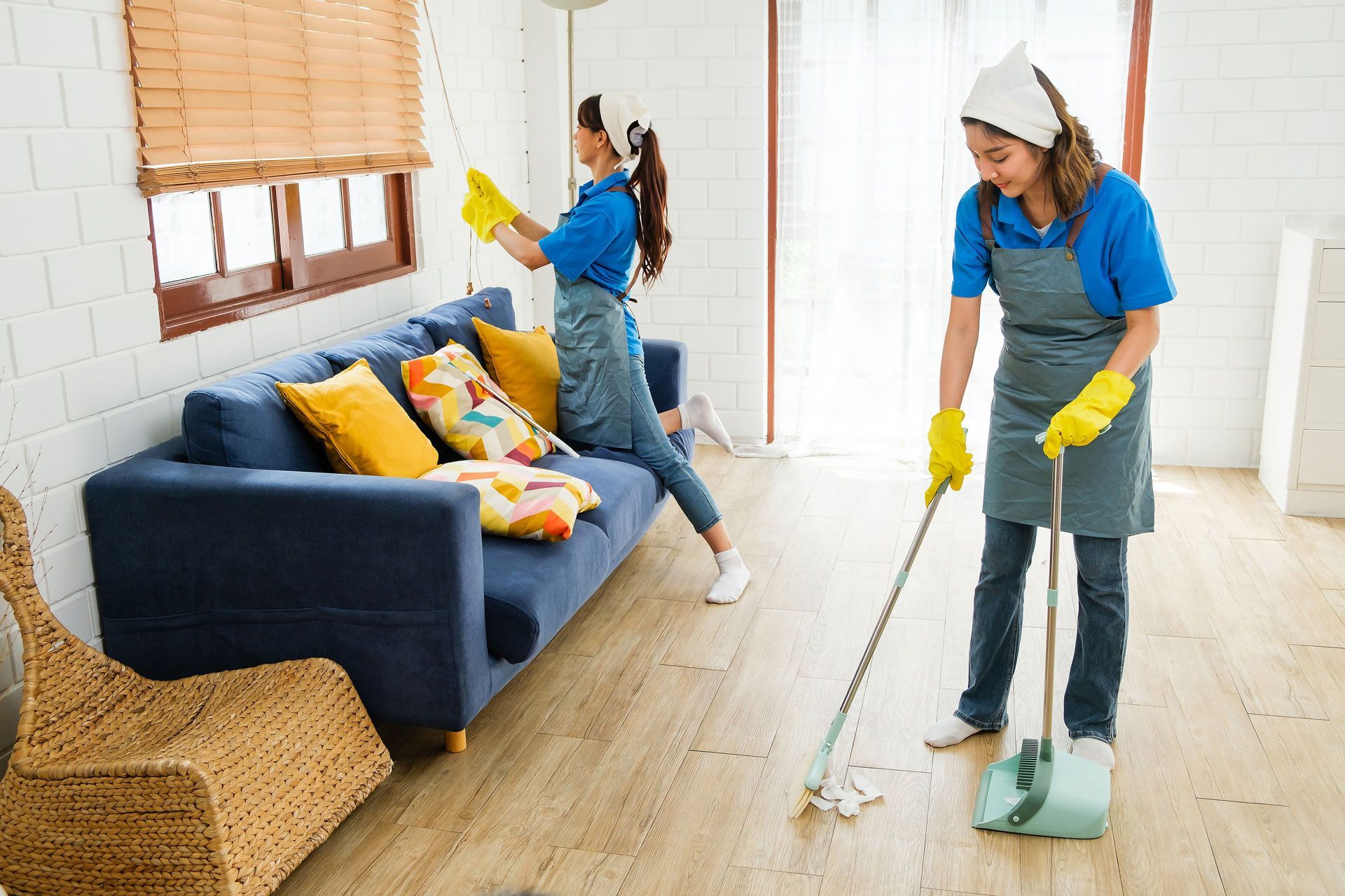 Women cleaning a living room