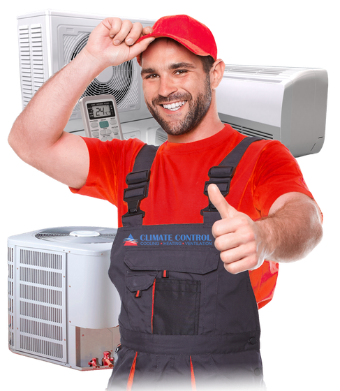 Smiling HVAC technician in red cap and shirt giving thumbs-up beside air conditioning units