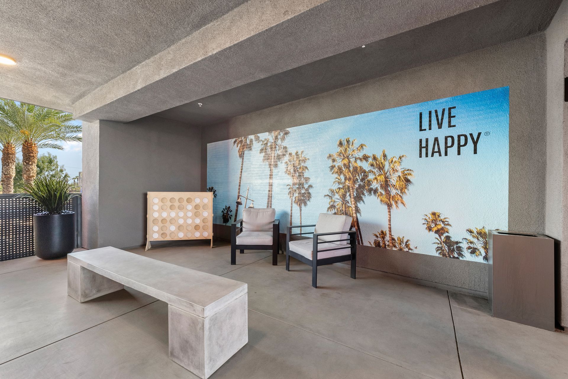 Sliding Photo Gallery Displaying Apartment Amenities - Mural and seating