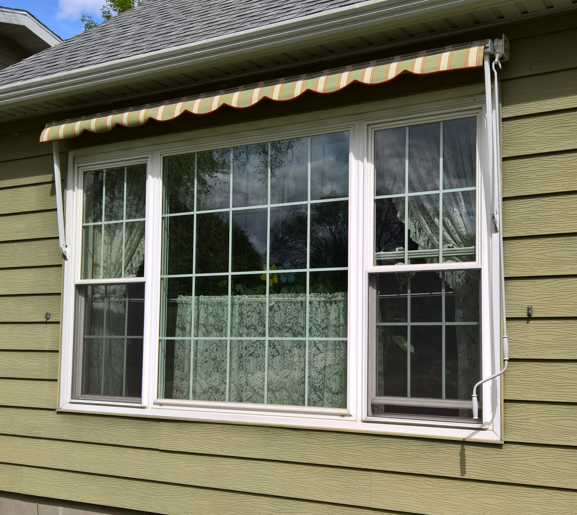 Opened Retractable Window Awning — Moorhead, MN — Olson Awning & Canvas