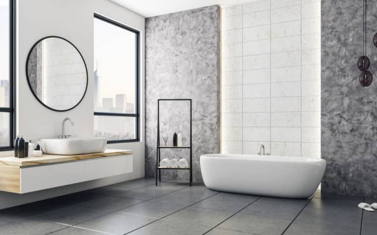 A Bathroom With A Bathtub , Sink , Mirror And Window — ARK Plumbing & Gasfitting In Moss Vale, NSW
