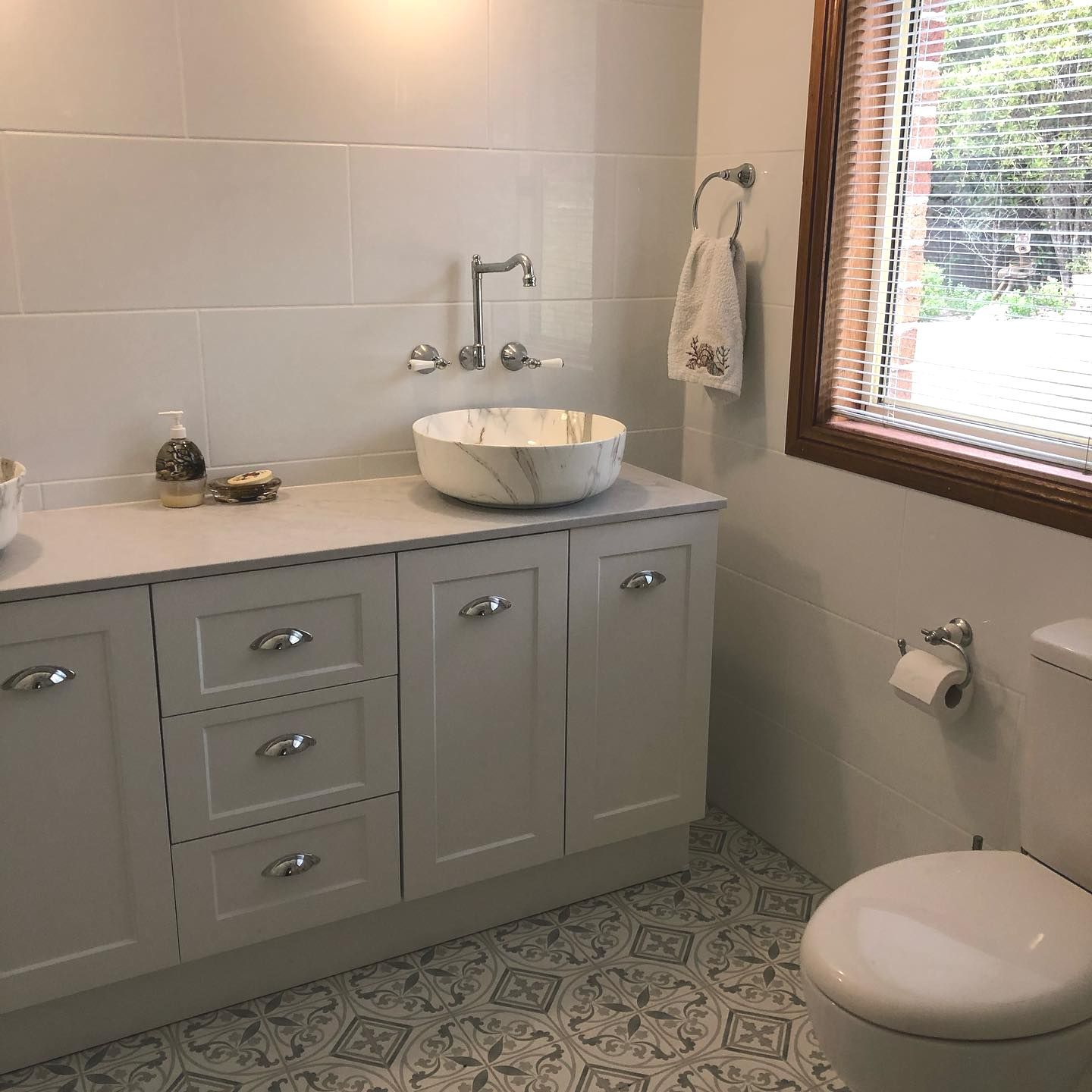 A Bathroom With A Sink , Toilet And Window — ARK Plumbing & Gasfitting In Exeter, NSW