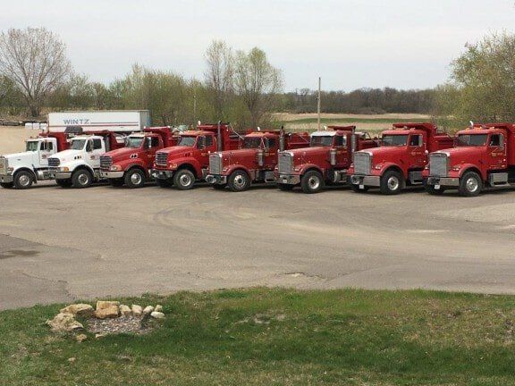 Fleet of DMJ Trucks - Paving and Asphalt Company in Medina, MN
