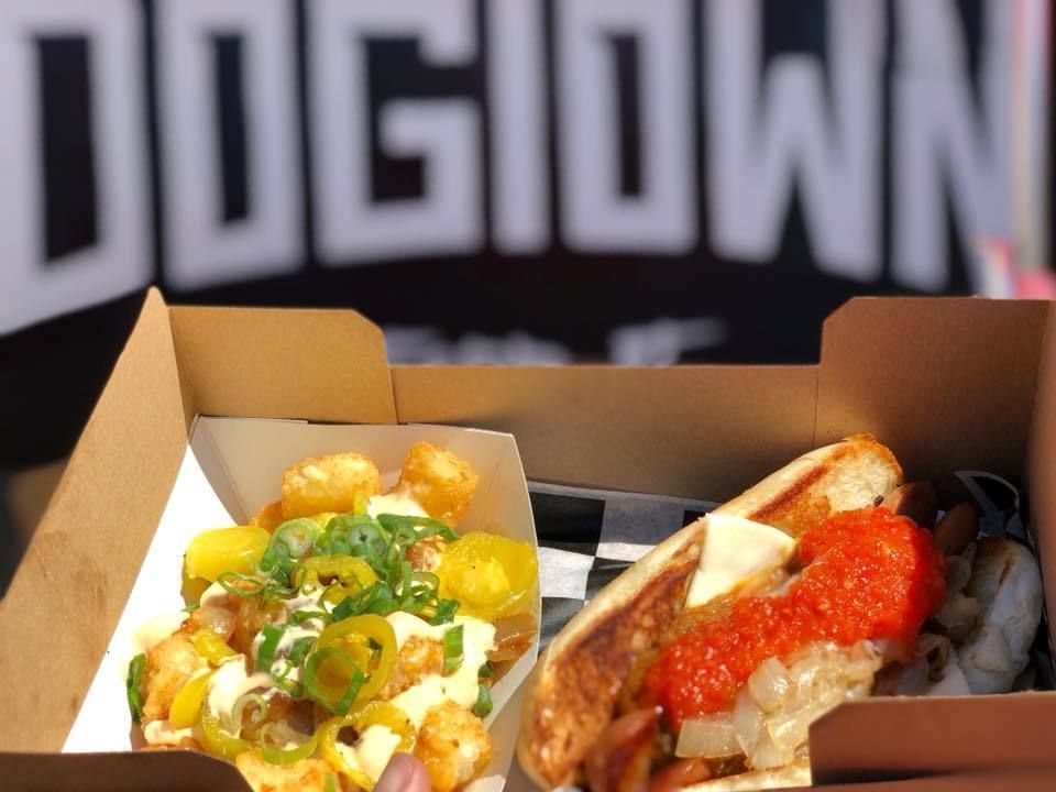 A box of food with the word dogtown in the background