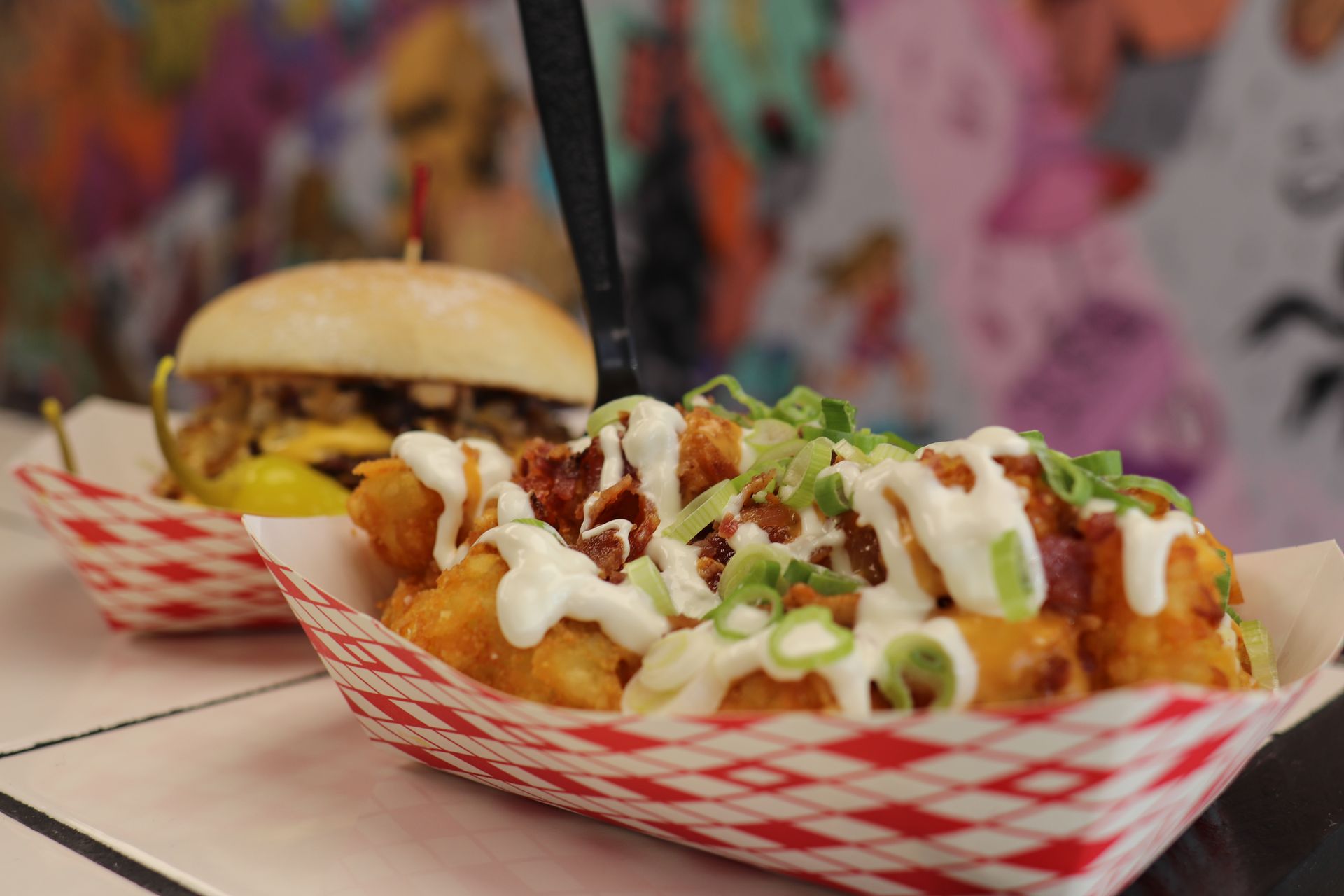 A close up of two trays of food on a table.