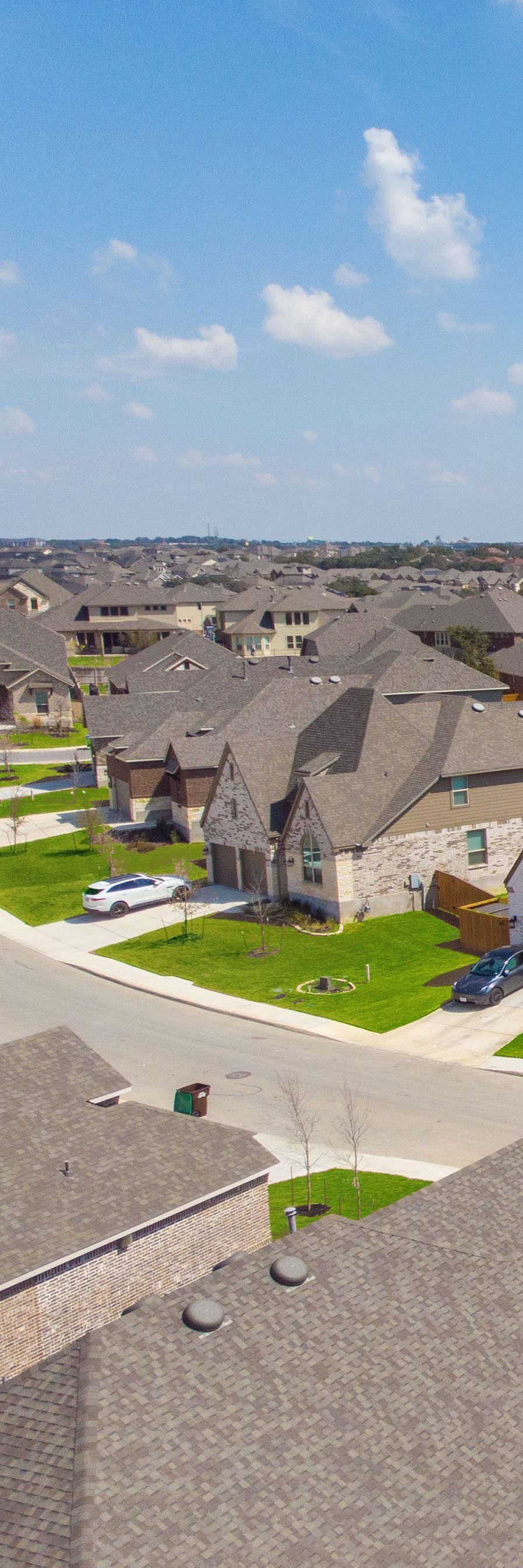 A house with a swimming pool in front of it.