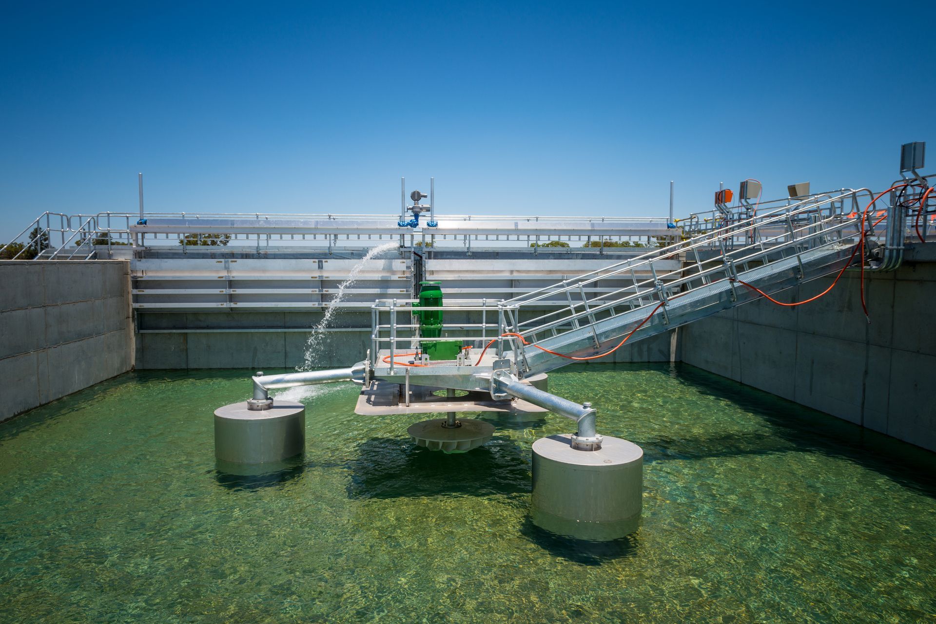 A machine is sitting in the middle of a large body of water.