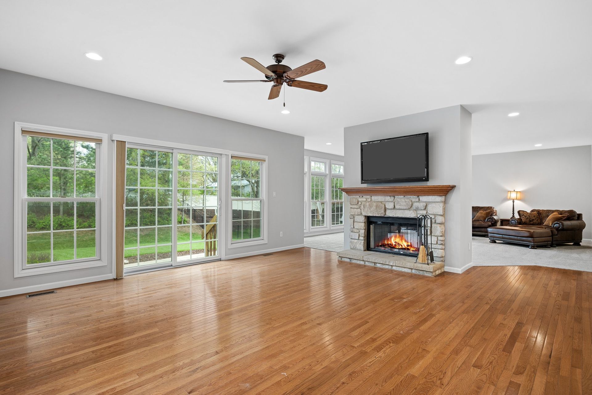 There is a fireplace in the middle of the living room.