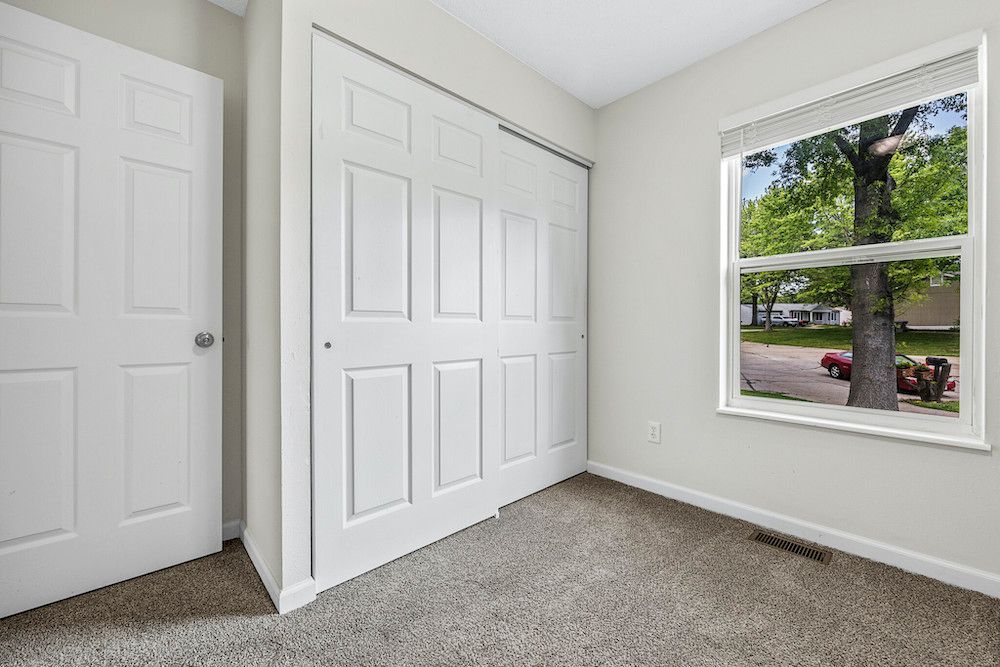 There is a large window in the middle of the room.