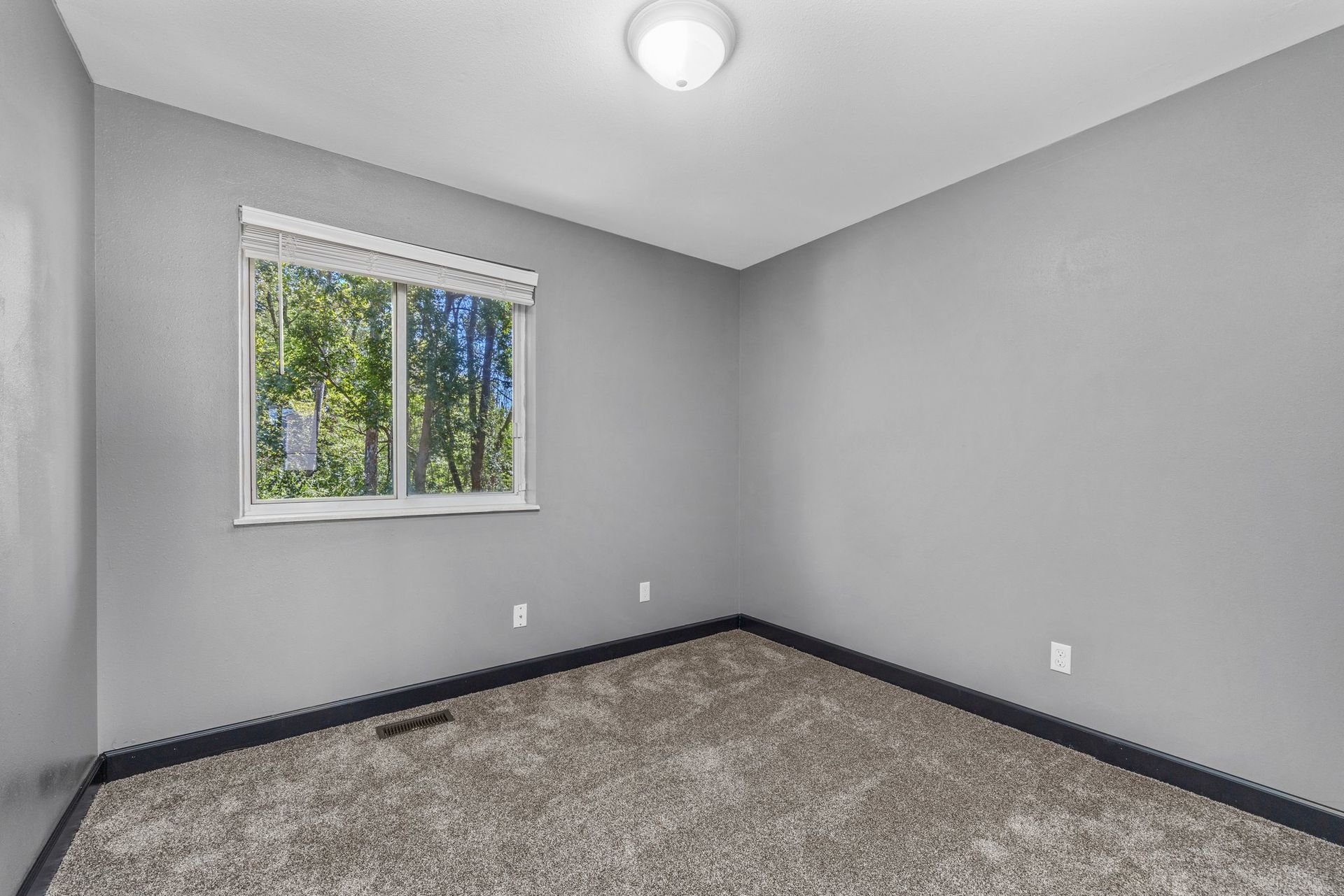 There is a large window in the middle of the room.