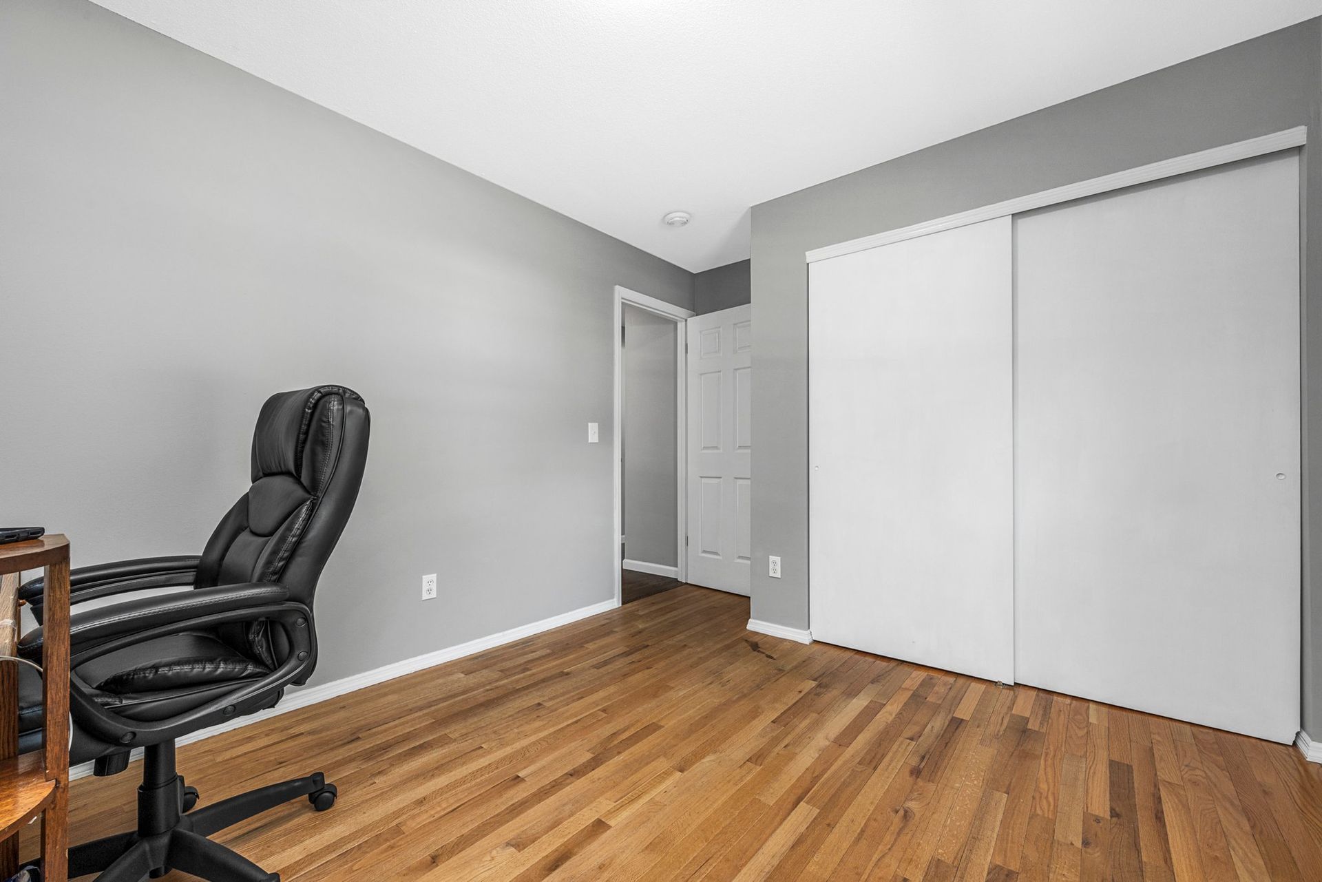 There is a chair in the middle of the room.