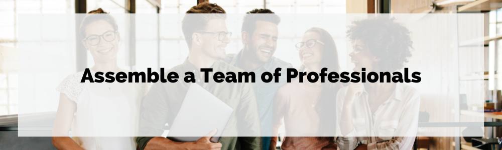 A group of people are standing next to each other in an office.